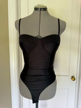 Black stretch bodysuit from Rainbow